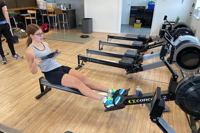 Melissa Shaw from the Shoreham Rowing Club taking her turn at rowing in a bid to beat the existing world record in the mixed 19 years and under heavyweight category in tandem rowing