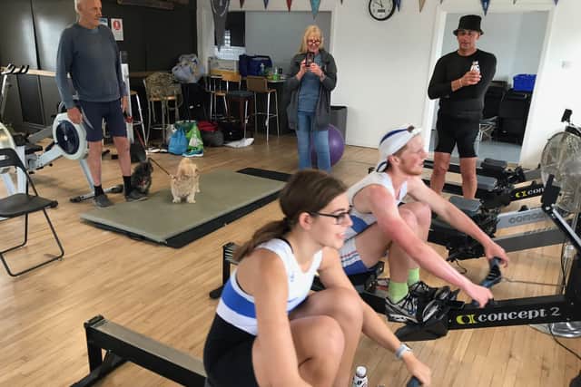 Jack and Melissa in full swing at Shoreham Rowing Club during their 48-hour row to beat the world record in tandem rowing