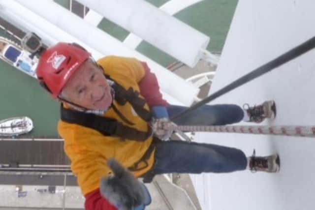 87-year-old Stuart Morris abseiling down Portsmouth's Spinnaker Tower