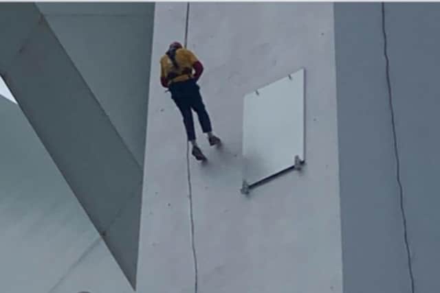 Nearly there ... 87-year-old Stuart Morris abseils 320ft down Portsmouth's Spinnaker Tower