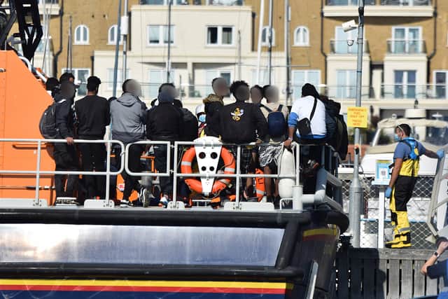 Suspected migrants arrive in Eastbourne. Picture from Dan Jessup SUS-210809-161956001