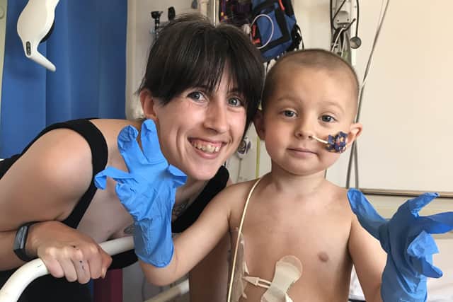 George and his mum, Roxanne, from Rustington, in hospital undergoing treatment for his stage four neuroblastoma
