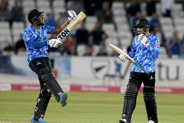 Chris Jordan and Rashid Khan in their Blast shirts - celebrating the quarter-final win over Yorkshire / Picture: Getty