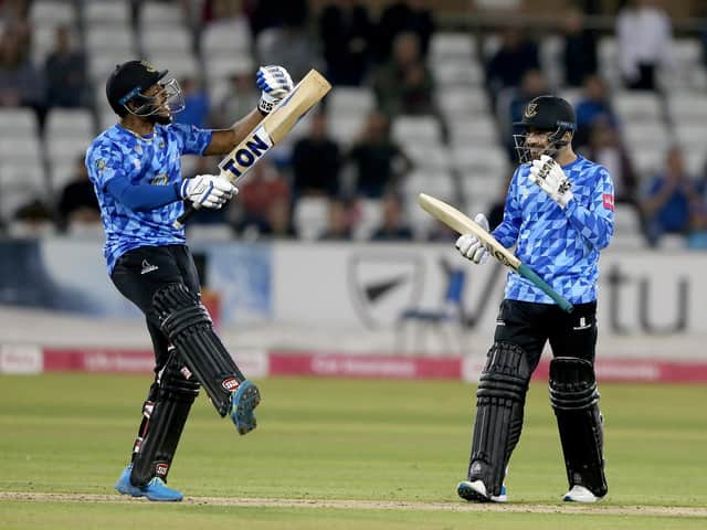 Chris Jordan and Rashid Khan in their Blast shirts - celebrating the quarter-final win over Yorkshire / Picture: Getty