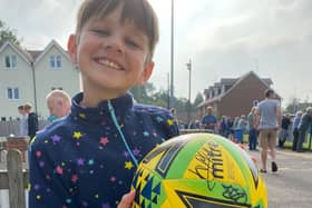 Florence, who celebrated five years in remission in February, received a signed ball from the Haywards Heath Town on her Go Gold Day