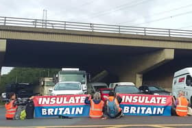 During rush hour today motorway traffic on the M25 was brought to a standstill by campaigners from Insulate Britain