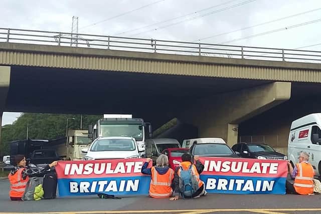 During rush hour today motorway traffic on the M25 was brought to a standstill by campaigners from Insulate Britain