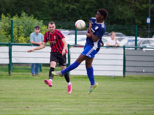 Sam Bull in action for Billingshurst in their FA Vase clash with Forest Hill Park. Pictures by Iain Gibson