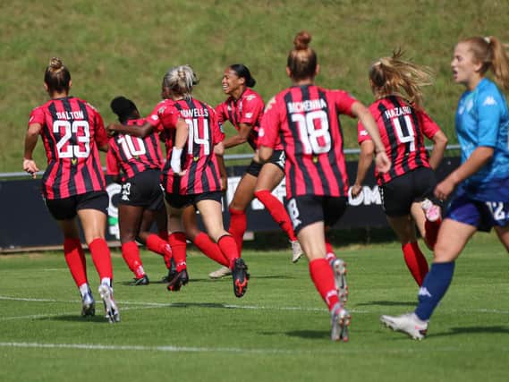 Ini-Abasi Umotong wheels away in celebration after netting for Lewes against London City Lionesses. Picture by James Boyes