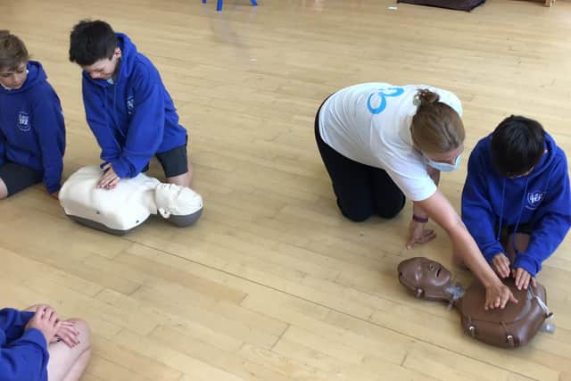 Teaching children how to do CPR