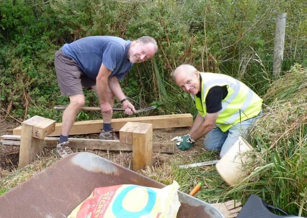 Ferring Conservation Group has completed the construction and installation of two rustic wooden benches on the Ferring side of the local Rife River. The bencheswere constructed by group committee member, Graham Tuppen, and he was assisted in the installation by fellow committee member Colin Annis and group chairman David Bettiss.