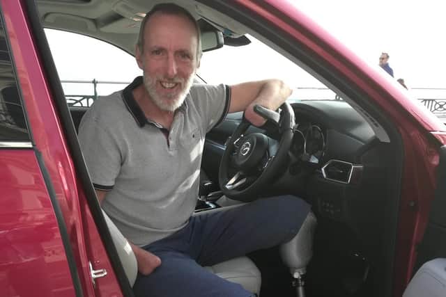 Mike has adapted to life after limb loss, and can now do many of the things he did before – including driving