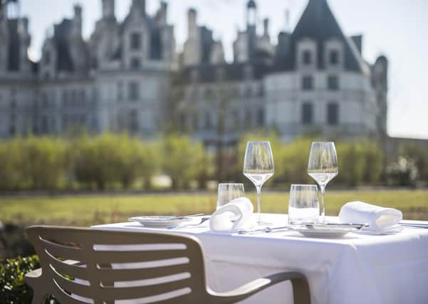 View from the restaurant terrace at Relais de Chambord. Photograph: TMCO Holdings/ Marugal