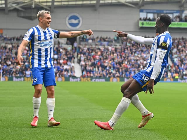 Danny Welbeck celebrates with Leo Trossard after the duo combined for Albion's second goal