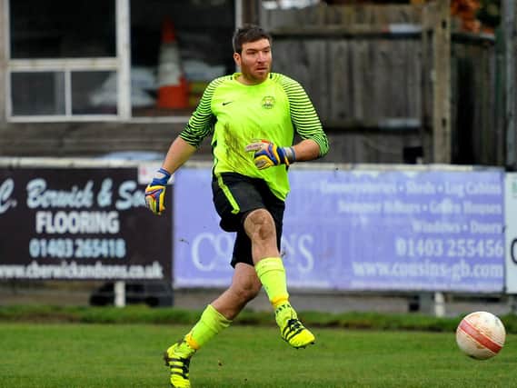 Aaron Jeal was kept busy in the Horsham YMCA goal. Picture by Steve Robards
