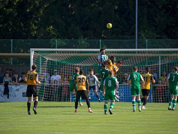 Chichester City clear a Maidstone attack / Picture: Neil Holmes