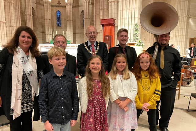 Arundel Festival chair Sharon Blaikie, University of Chichester orchestral manager Simon Growcott, Arundel mayor Tony Hunt and two of the musicians from the Sleepy Lagoon Orchestra with, from left, Herbie, Amara, Holly and Madeleine