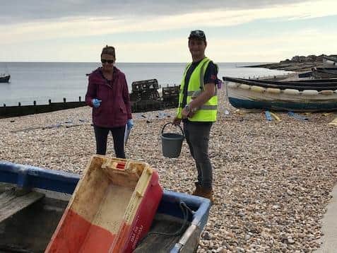 A team of 32 volunteers picked up litter on the beach, weighing the finds and recording the data as part of a global cleaner oceans mission