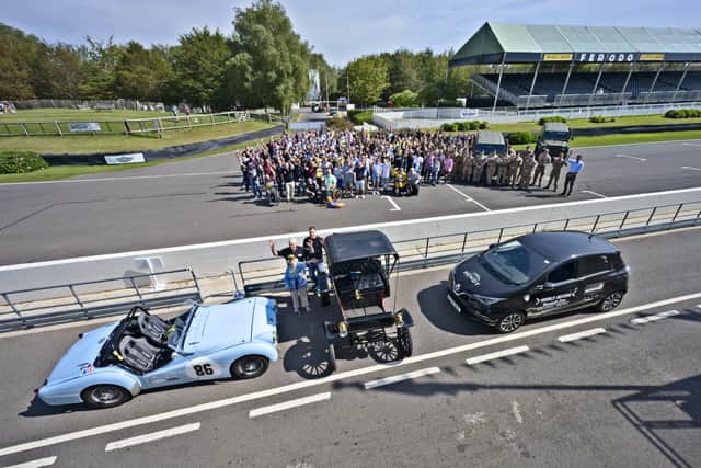 Beneficiaries and representatives at the Mission Motorsport event at Goodwood Motor circuit