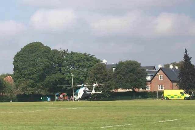 An air ambulance landed in nearby Oaklands Park