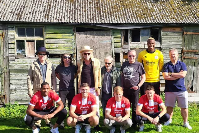 Bob Geldof and the Boomtown Rats with Crawley Town boss John Yems (right) and Reds players
