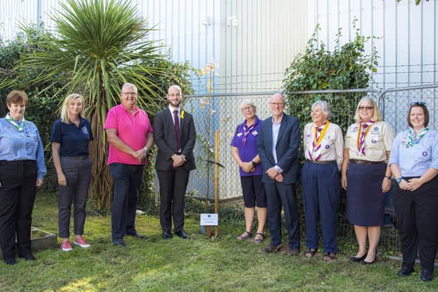 Gathered around the tree planted in Tony Squires' memory, from left, Beaver leader Laura Stoddart, 5th Littlehampton Sea Scouts chairperson Rachel Kerwick, Littlehampton councillors David Chace and Freddie Tandy, deputy mayor Jill Long, Nick Gibb MP, Wendy Squires, Arundel and Littlehampton District Scouts representative Jill Gladman, Scout leader Clare Frostick. Picture: Lilla Wantuch-Michalska / Lilla WM Photo