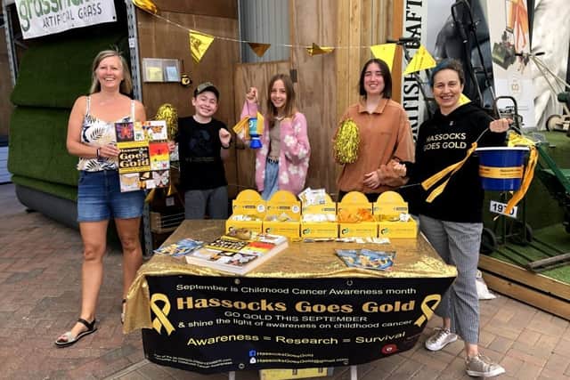 Volunteers at the Hassocks Goes Gold stall at South Downs Nurseries on Saturday, September 18. From left: Linda Poat, Milo BartlettBundy, Erin Poat (one of the poster competition winners), Martha Bartlett and Rachel BartlettBundy.