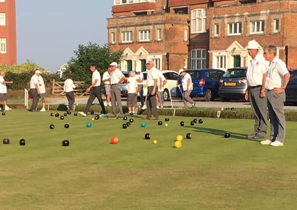 Players on the green at Gullivers Bowls Club