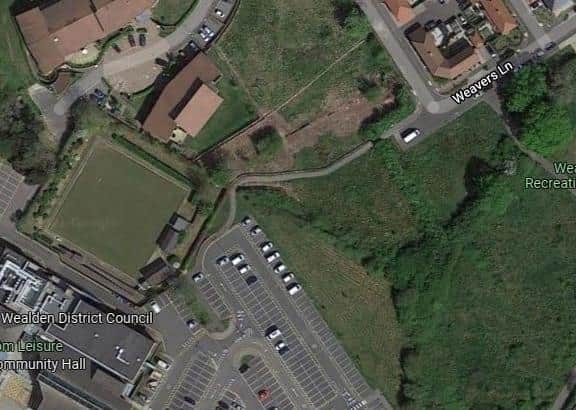The footpath runs between the Freedom Leisure Centre car park and Reef Way development. Photo from Google Maps. SUS-210927-143929001