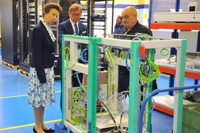 Princess Anne inspects the wiring. Picture: Steve Robards .