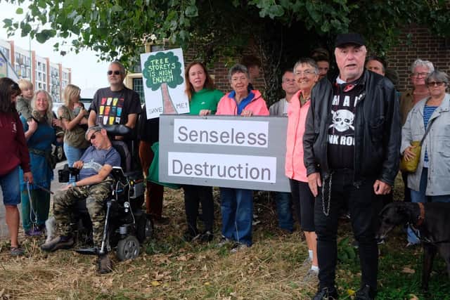 Campaigners protesting against the loss of the poplar tree which could be cut down as part of redevelopment plans for the  former Adur Civic Centre site