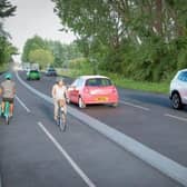 An artist's impression of the plans for a new Chichester to Emsworth cycle and walking route on the A259. Picture by National Highways SUS-210928-124321003