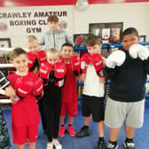 Crawley Boxing Club’s new batch of young hopefuls with junior star Harry Parsons