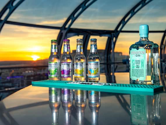 Watch the sun set while tasting Brighton Gin on the i360