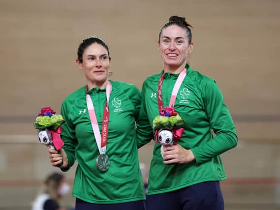 Silver medallists Katie-George Dunlevy (left) and pilot Eve McCrystal of Team Ireland pose during the women's B 3,000m Individual pursuit track cycling medal ceremony at Izu Velodrome. Picture by Kiyoshi Ota/Getty Images