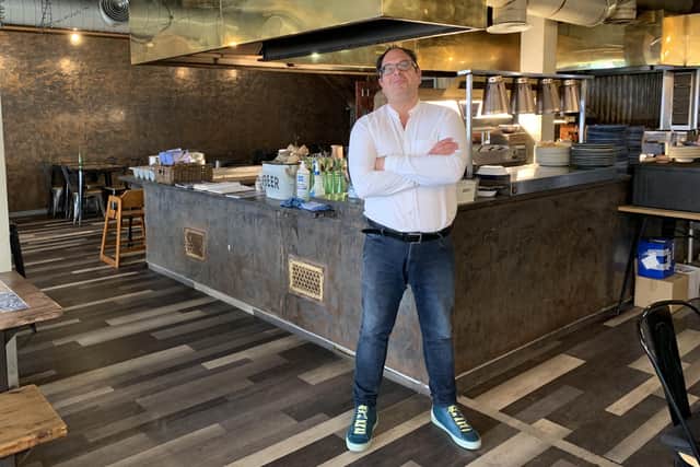 Andy Sparsis, owner of The Fat Greek Taverna in Worthing, challenged the Employment Minister and local MP for Worthing to work a shift in his restaurant
