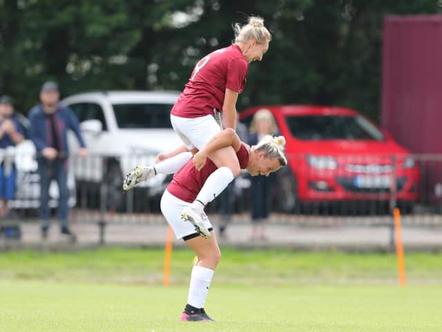 Molly Hill and Georgia Tibble come up with an unusual goal celebration during Hastings United Women's great start to the season / Picture: Scott White