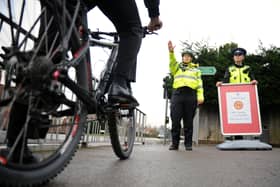 PCSOs stop a cyclist on a footpath.

Picture: Allan Hutchings (150133-430) PPP-150126-150450001