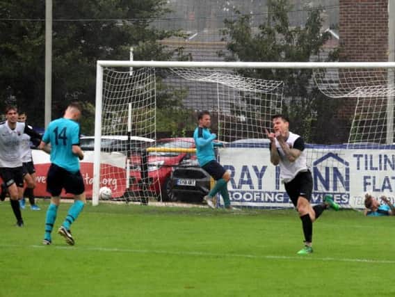 Jack Langford celebrates scoring the winner. Picture by Roger Smith