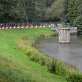 Improvement works to Buckshole reservoir, in Alexandra Park, including a new outlet pipe and spillway. SUS-210410-123317001