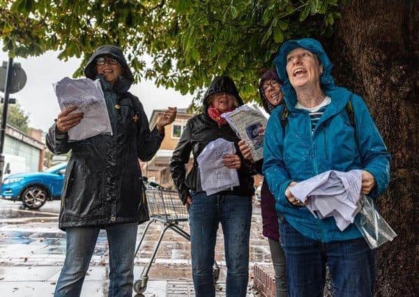 Singing in the rain, Paddock Singers add their voices to the collection Photo credit Nigel French and Melanie Hobson