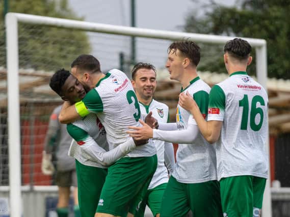 Rocks celebrate a goal against Brightlingsea Regent on Saturday. Picture by Lyn and Trevor Phillips