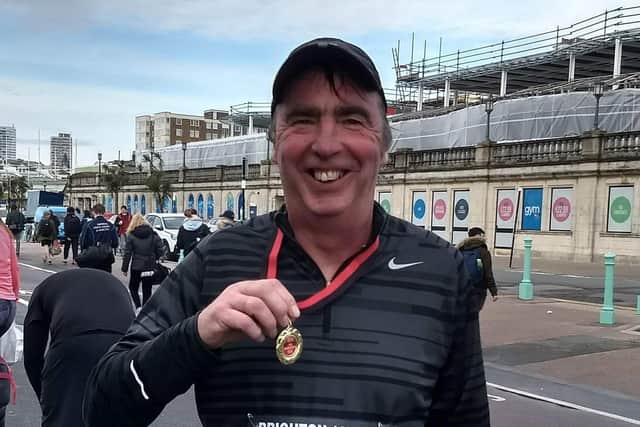 Ronnie Green after the Brighton 10k 2019 with a big beaming smile, something he can no longer do