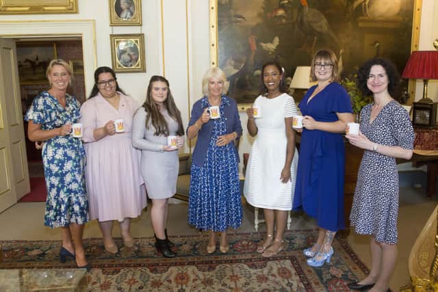 The Duchess of Cornwall with her guests at Clarence House