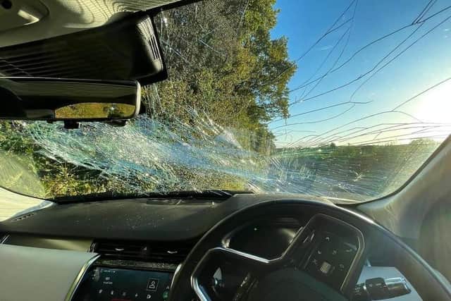 A car windscreen was cracked by loose planks falling off of a van near Singing Hills golf club on Thursday, October 6. Picture: Jayne Adams. SUS-210710-182212001