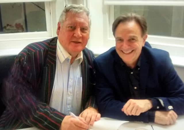Brian Capron (right) with Anderida Writers chairman Tony Flood SUS-210710-151554001
