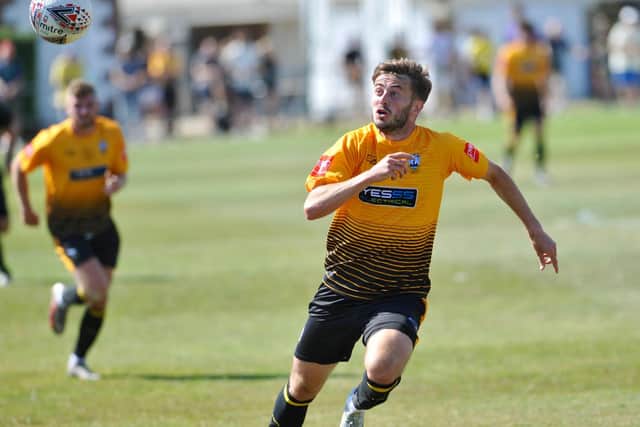 Joe Benn on the chase for Golds in the FA Cup win over Broadbridge Heath | Picture: Stephen Goodger
