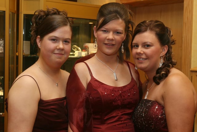 Laureen McQuilkin with sisters Nicola and Kelly McCallion, arriving for the St.Brigid's College, Carnhill, annual formal held at the Everglades Hotel. (0312T02).