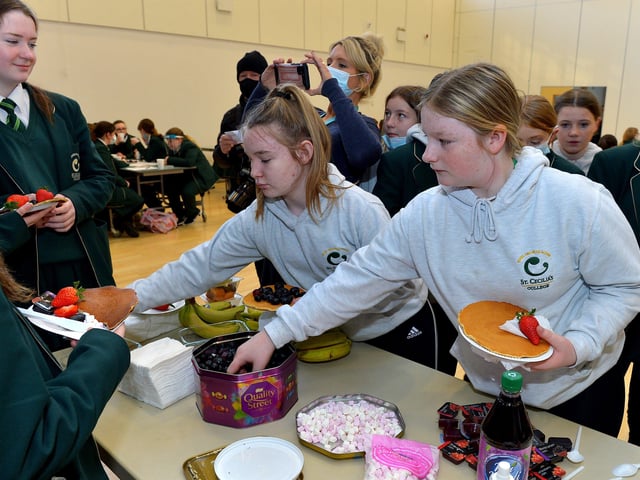 St Cecilia’s College Year 8 pupils having a pancake breakfast at the school on Tuesday morning last. DER2209GS – 017