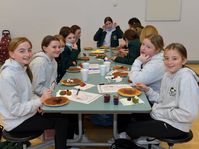St Cecilia’s College Year 8 pupils Molly, Sophia, Renna and Brooke pictured during a pancake breakfast at the school on Tuesday morning last. DER2209GS – 020